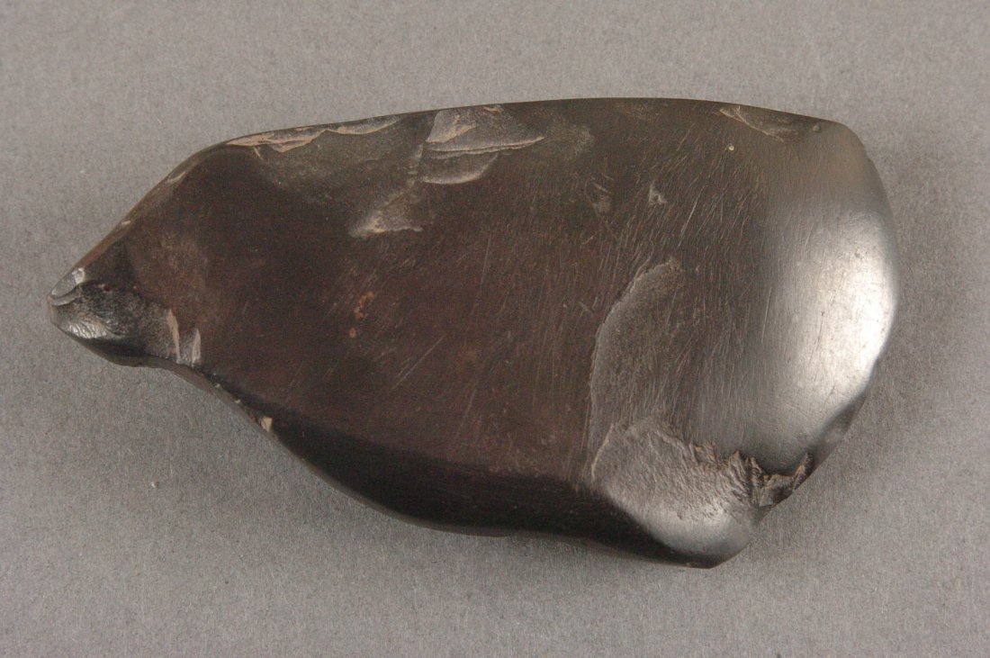 3.5 INCH HEMATITE AXE: 3.5 x 2 inches.