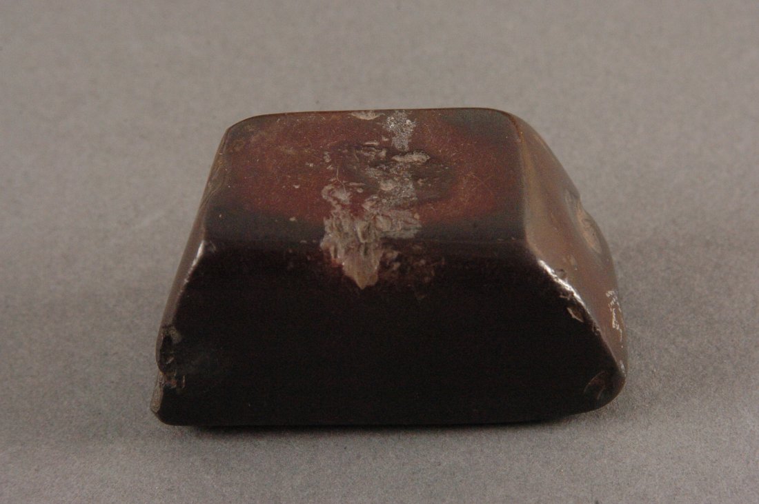 1.75 INCH HEMATITE AXE: 1.75 x 1.25 inches.