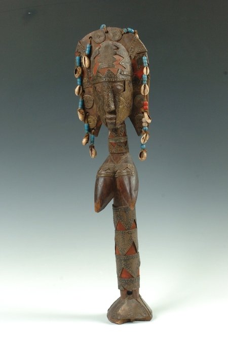 MARKA HAND-HELD WEDDING WAND, MALI: Wand in the form of a woman made of wood, fabric and copper sheets with a beaded head dress. 21 inches.