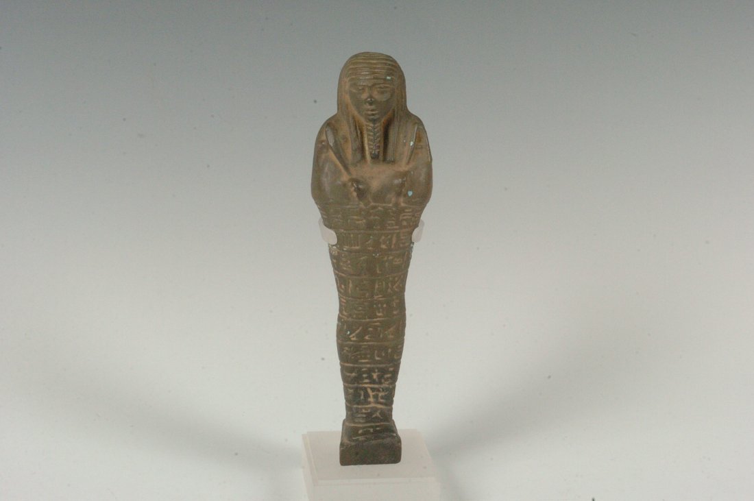 EGYPTIAN BRONZE USHABTI FIGURE: With flecks of turquoise paint, 7 inches. Not guaranteed to be ancient, but assumed to a reproduction.