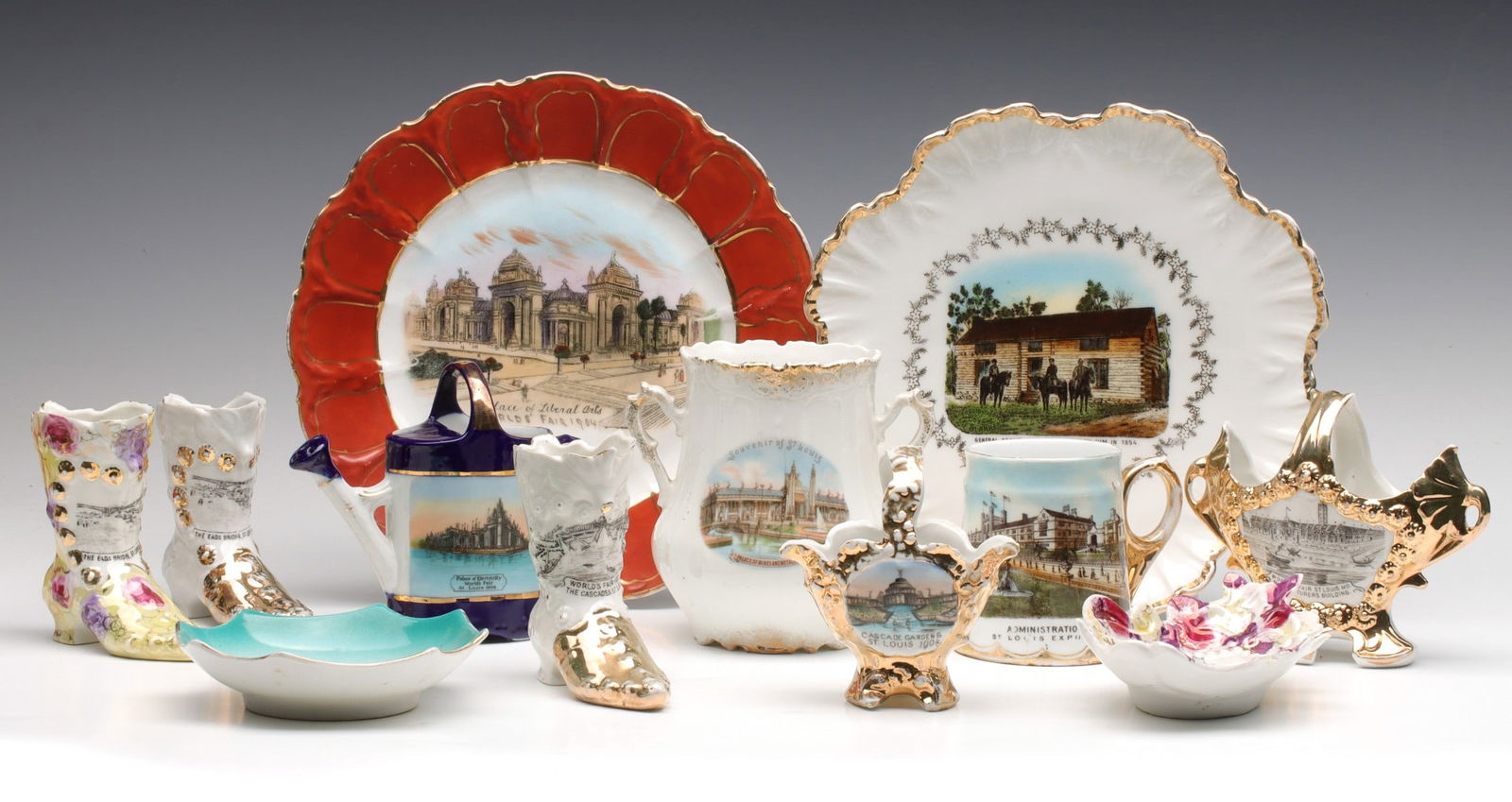 A COLLECTION OF 1904 WORLD'S FAIR SOUVENIR CHINA: The collection of porcelain souvenirs includes plates, figural boots, bowls and vases as shown. Sizes range from 1 to 8.5 inches. Without proof of exemption, be aware that internet sales tax applies t