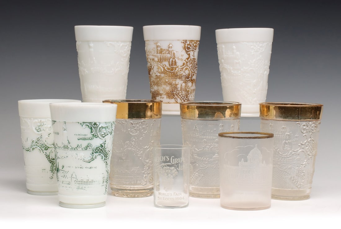 A COLLECTION OF 1904 WORLD'S FAIR TUMBLERS: Includes an etched glass advertising Welch's Grape Juice. Measures from 3 to 5 inches tall. Without proof of exemption, be aware that internet sales tax applies to all Internet transactions and local 