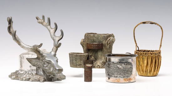 1904 WORLD'S FAIR SOUVENIR INK STANDS, MUG, BASKET: 1) A figural stag inkstand with glass inkwell, engraved text reads 'World's Fair St. Louis 1904.' 2) A white metal figural stump inkstand with copper inkwell insert, impressed lettering reads 'St. Lou