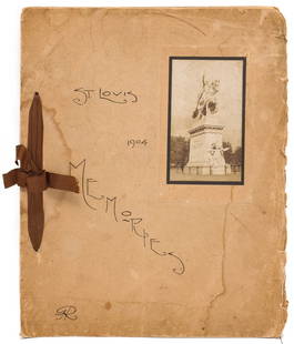 A PHOTO ALBUM SCRAPBOOK FOR THE ST. LOUIS WORLD'S FAIR: The paperback scrapbook with the hand written title of 'St. Louis Memories 1904.' Includes 22 emulsion photographs of the 1904 World's Fair. Measures 12.5 x 10 inches. Without proof of exemption, be a