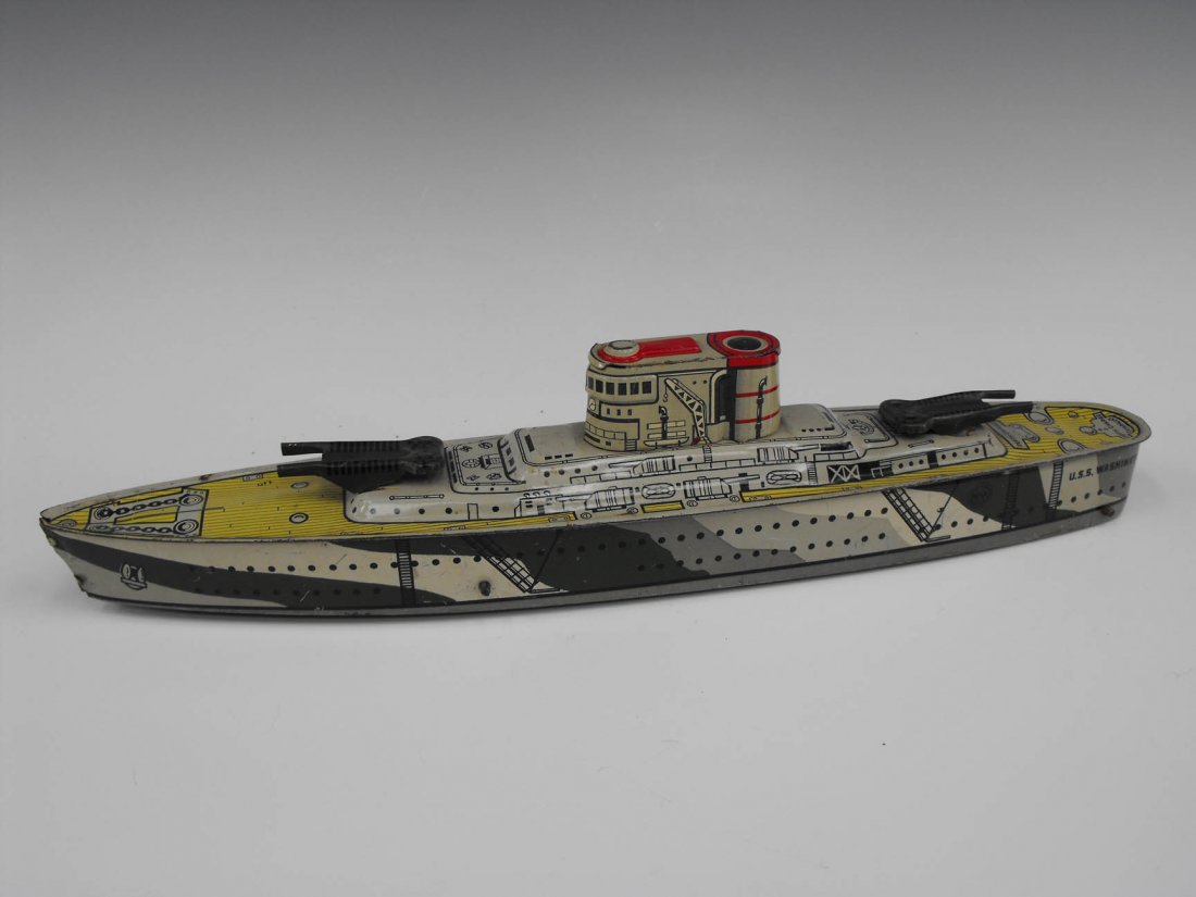 MARX TIN TOY BATTLESHIP FLOOR TOY: Marx tin toy battleship floor toy. Measures 2.75 x 14.5 inches.
