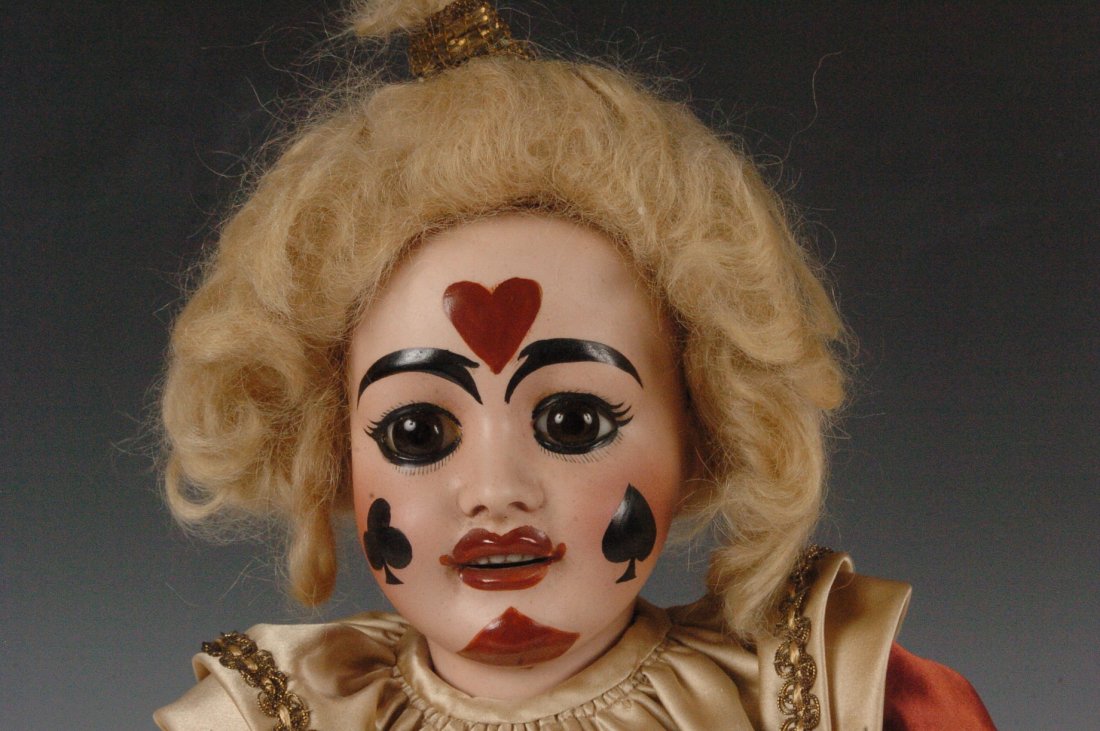 FAVORITE MASSON BISQUE HEAD FRENCH DOLL LIMOGES: Bisque Socket head, with Impressed Marks of Depose, Fabrication Francaise, Favorite, No 6, J E Masson sc, AL & Cie, Limoges, Fixed brown paperweight eyes, Open mouth, Pierced ears, Cardboard pate, Bal