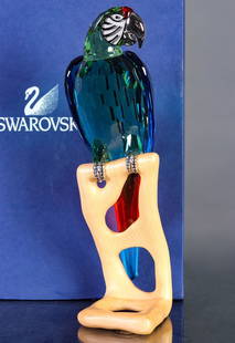 SWAROVSKI OBJECT MACAW WITH BOX: Object Macaw A 9600 NR 000 011/685824 with boxes as pictured. Measures 9.25 x 3 x 2.5 inches. Without proof of exemption, be aware that internet sales tax applies to all Internet transactions and loca