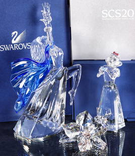 THREE SWAROVSKI CRYSTAL FIGURES WITH BOXES: 1) Snow White Disney Figurine with box, #994881, measures 5 inches. 2) Isadora, Magic Of Dance with box, #200200, measures 7.75 inches. 3) Jubilee Edition 2007 Crystal Society hibiscus flower with a b