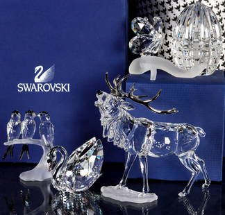 THREE SWAROVSKI CRYSTAL FIGURES WITH BOXES, PLUS TWO: 1. Swallows, A 9100 NR 000 077/0892039. Measures 3.25 x 3 x 1.25 inches. 2. Large Swan, 5004723. Measures 2.25 x 2.5 x 1.75 inches. 3. Stag, A 7608 NR 000 004/291431. Measures 5.5 x 5.25 x 2.5 inches.