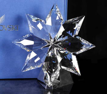 SWAROVSKI 2013 LTD ED LUMINATED CHRISTMAS STAR: Limited edition 2013 luminated Christmas star with power cord, engraved number 280/500, includes brochure, instructions, certificate of authenticity, gloves, and boxes. Measures 10.75 x 10.5 x 5 inche