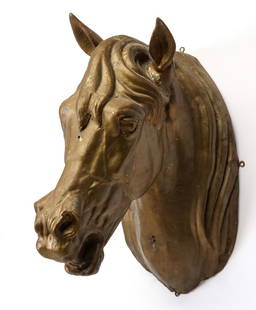 A FULL BODIED ZINC 19TH CENTURY HORSE HEAD TRADE SIGN: The hollow wall mount figure is found in old re-paint. Measures 22 x 9 x 19 inches. Provenance: Private Collection Denver, Colorado. Without proof of exemption, be aware that internet sales tax