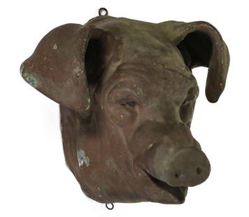 A 19TH CENTURY MOLDED ZINC PIG HEAD BUTCHER TRADE SIGN: The hollow molded figural head in zinc has an unusual old verdigris surface suggestive of copper. Measures 10 x 11 x 10 inches. Provenance: Private Collection Denver, Colorado. Without proof of exempt