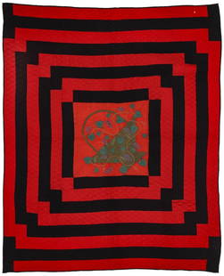 A 19TH C. RED AND BLACK QUILT WITH TRAPUNTO BASKET: The simple, two color design similar to Housetop pattern, with considerable visual impact, is centered by a folky basket and exuberant whirling grapevines in very tightly packed colored cottons finely