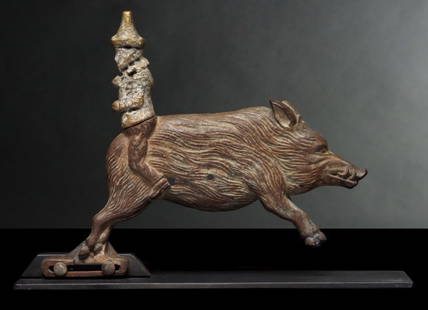 A RARE C.W. PARKER KNOCKDOWN SHOOTING GALLERY TARGET: The running boar with a clown aboard - facing backwards - is signed Manuf' by CW Parker Abilene Kansas with the number 12. Pictured in Parker's Catalog of Shooting Galleries, Model No. 6 on page 8 and