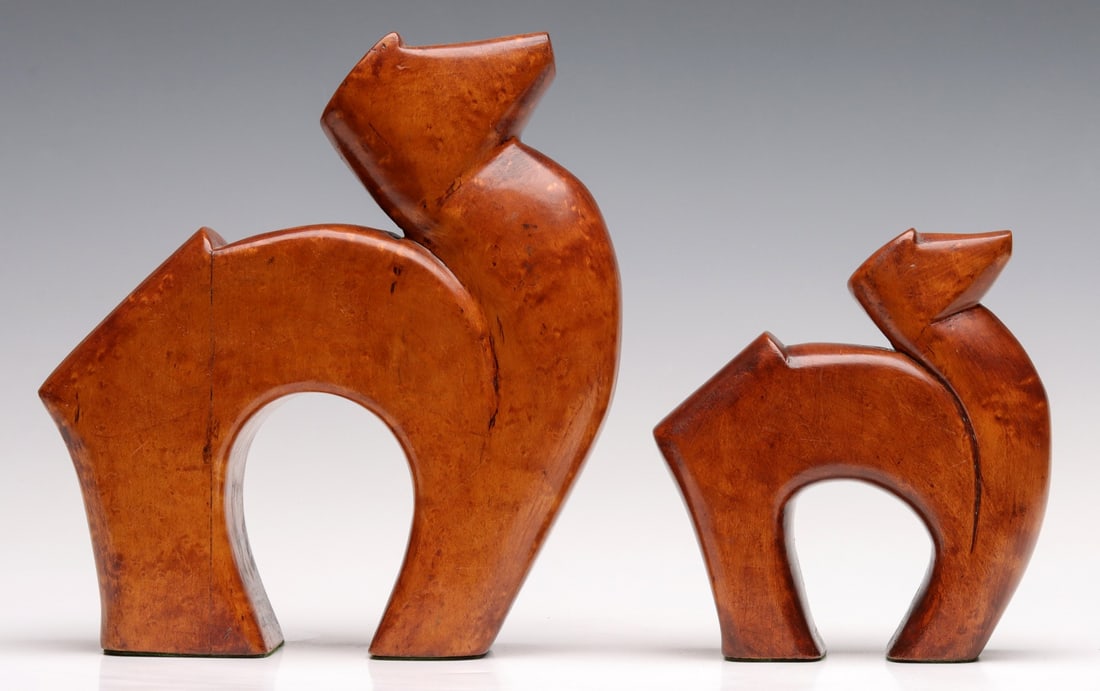 A PAIR CARVED BIRD'S EYE MAPLE STYLIZED CAMEL FIGURES (1 of 18)