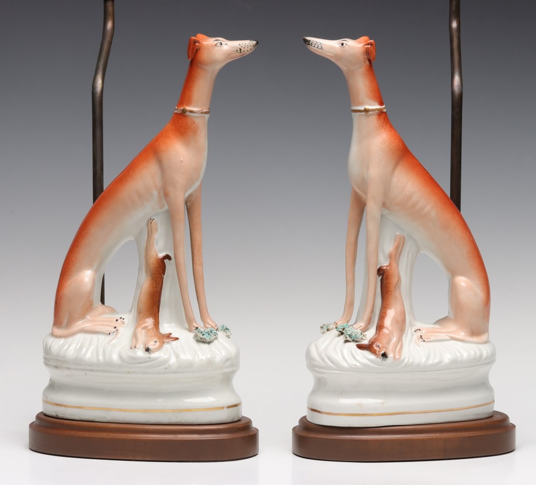 A PAIR 19C. STAFFORDSHIRE POTTERY WHIPPETS NOW LAMPS: The proper facing pair are mounted to quality lamp bases as shown. Each measures 23 x 8 x 4.5 inches. Without proof of exemption, be aware that internet sales tax applies to all Internet transactions 