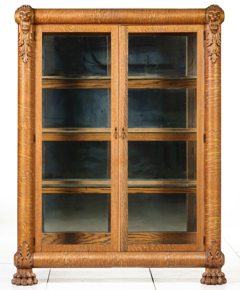 AN EARLY 20TH CENTURY OAK BOOKCASE WITH LION'S HEADS (1 of 13)