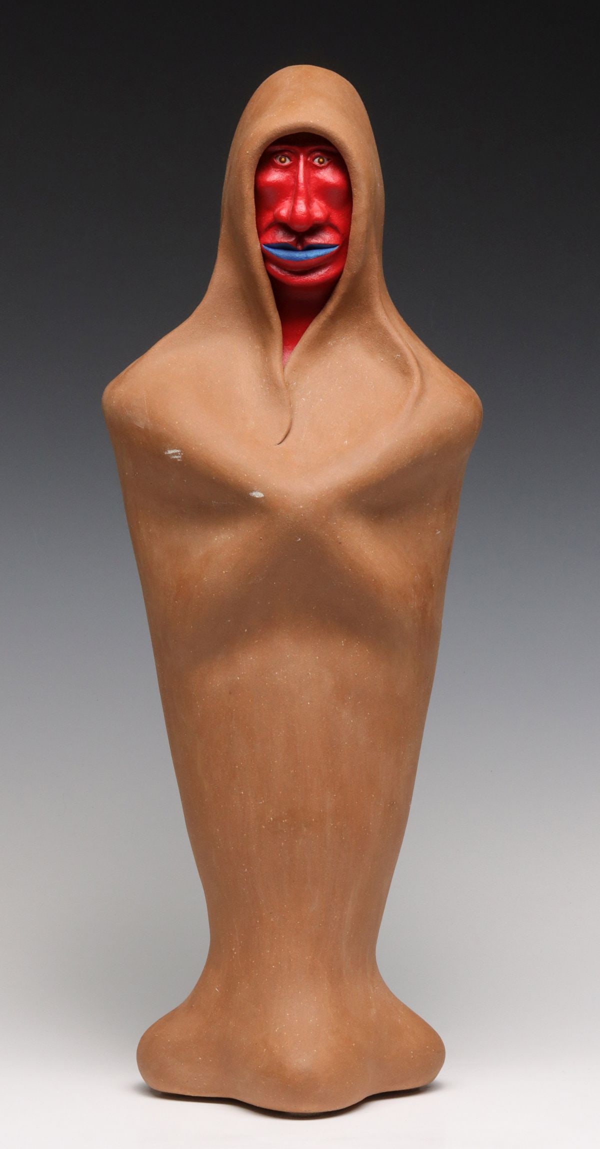 BARRY COFFIN (KANSAS 1947-2016) MIXED MEDIA SCULPTURE: Barry Coffin (Kansas Native American 1947-2016) The tall figural ceramic sculpture is a Modernist interpretation of a Taos man in traditional robe. The work is signed B. Coffin in scratched cursive al