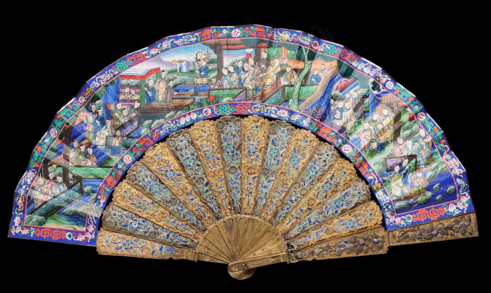 AN AMAZING CHINESE GOLD VERMEIL FILIGREE & ENAMEL FAN: This outstanding example is comprised of sixteen intricate filigree sticks; seven without gold wash and nine with gold wash - all applied with elaborate enamel floral decoration. The accordion leaf is