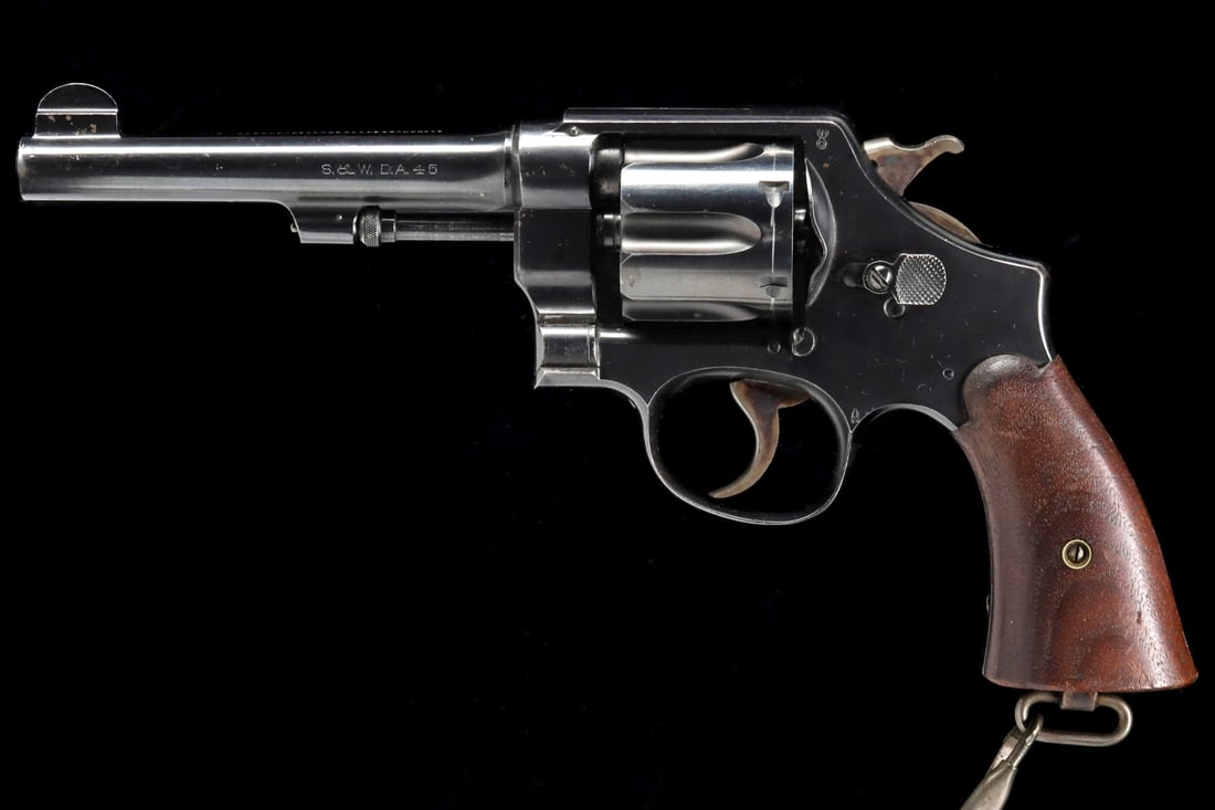 US ARMY SMITH & WESSON 45ACP M1917 REVOLVER: Smith and Wesson .45 M1917 (serial #:117247) Serial number places the year of production at 1918. The top of the barrel has the two line S&W address and patent dates, the left side is marked S&W DA 45