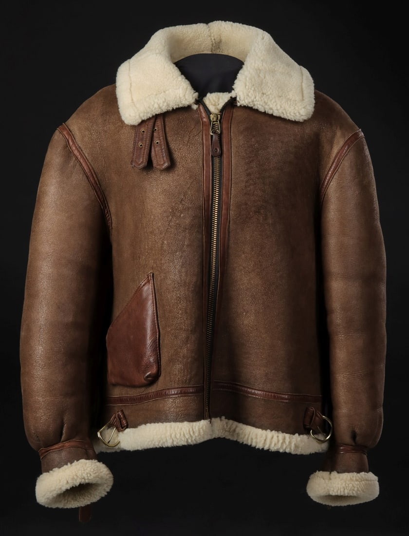 ORCHARD BRAND B-3 TYPE SHEARLING AVIATOR JACKET: The undecorated copy of a WWII sheepskin leather bomber jacket was made by Orchard Motorcycle in size 48. We happily provide seamless in-house packing and shipping services on nearly everything we sel