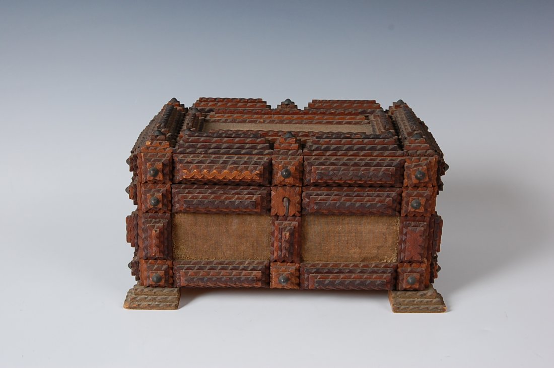 TRAMP ART BOX WITH KEY: Tramp art box with purple velvet lining, key to front, but missing latch. Cloth panel centers to each side, appears to be velvet base. 6 x 6.5 x 10.5 inches.