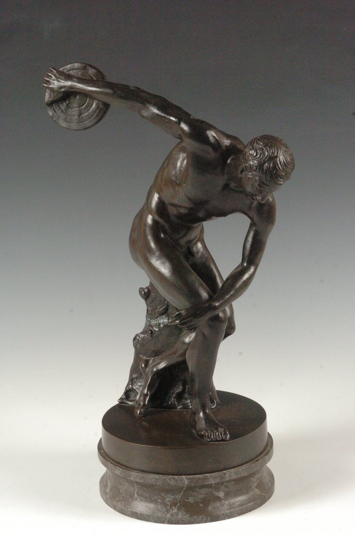 LATE 19TH C. GRAND TOUR BRONZE FIGURE OF AN ATHLETE: Illegibly signed on the woody stump behind the figure, founders mark of Morelli E. Rinaldi Roma measures 16 x 9.5 inches. The faux marble wood base is a later addition, probably the work of Richard Tu