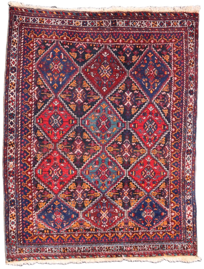 A 20TH C. PERSIAN RUG WITH GRID OF STEPPED DIAMONDS (1 of 6)