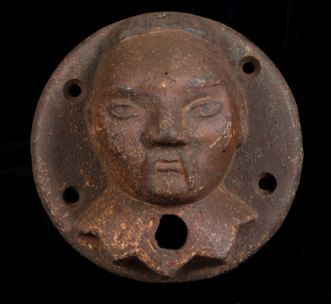 A CURIOUS HEAVY IRON ASIAN MALE MASK ORNAMENTAL ELEMENT (1 of 8)