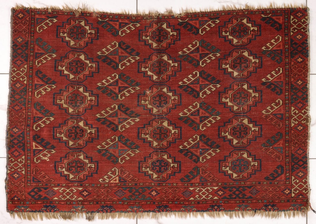 AN ANTIQUE TURKOMAN CHUVAL FRAGMENT (1 of 6)