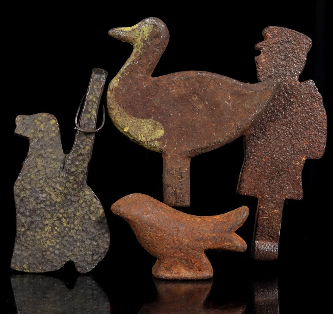 FOUR EARLY 20TH C. CAST IRON SHOOTING GALLERY TARGETS (1 of 7)