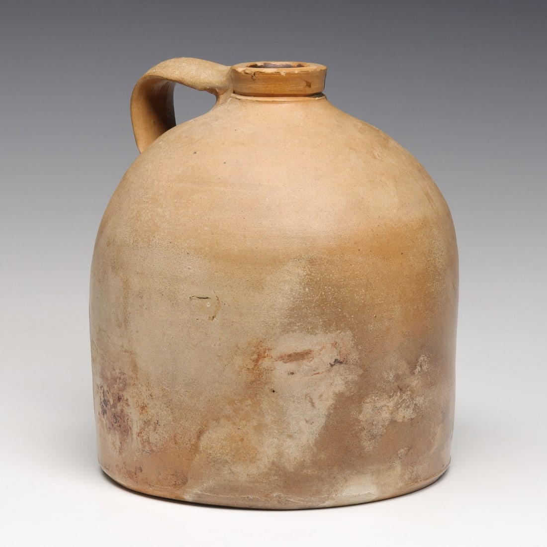 A G. A. JEGGLIN CALHOUN MISSOURI STONEWARE JUG: The beehive jug with applied strap handle is stamped. -FROM- G. A. JEGGLIN CALHOUN, MO. Measures 8.5 x 7.5 inches. Without proof of exemption, be aware that internet sales tax applies to all Internet 