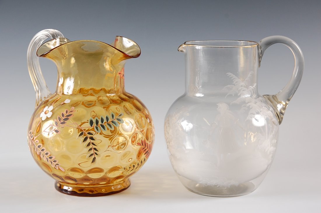 TWO VICTORIAN ENAMELED PITCHERS INCL. MARY GREGORY TYPE: Measure 9 x 7.5 inches and 8.5 x 7 inches.