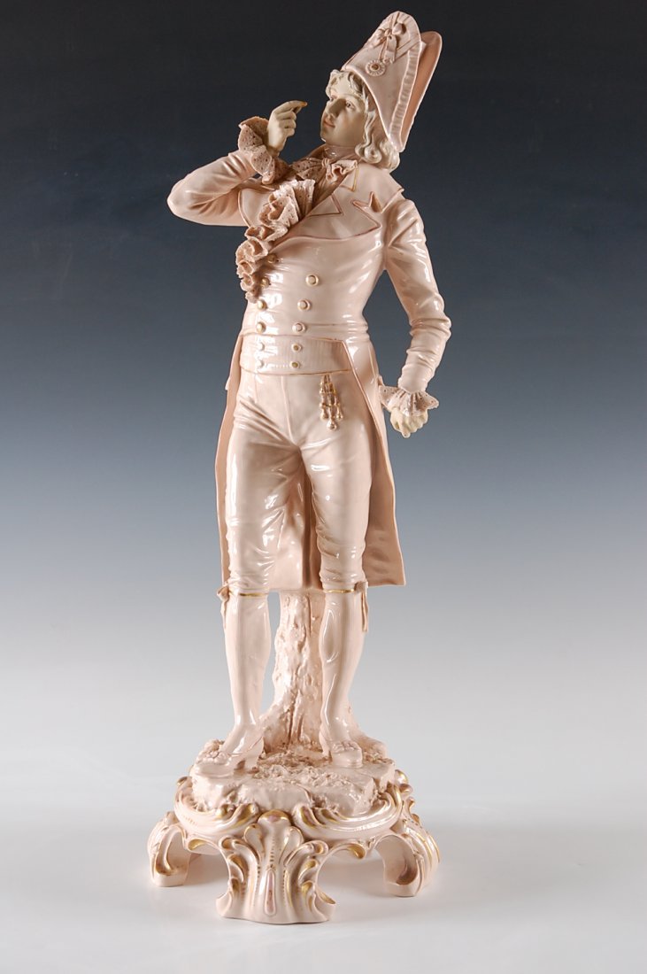 LARGE CONTINENTAL PORCELAIN FIGURE OF 18TH-C. DANDY: Pink applied triangular Royal Dux mark. Measures 21.75 inches.