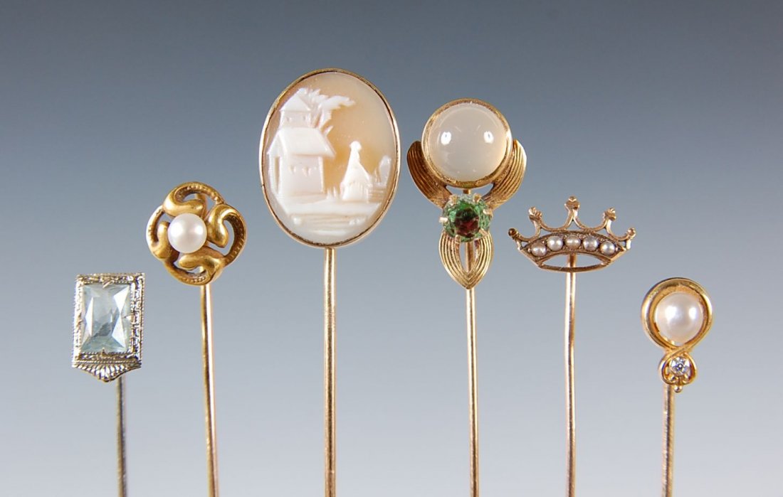 SIX ANTIQUE STICKPINS MARK 14 K: Including one with pearl and tested diamond, another with carved shell cameo