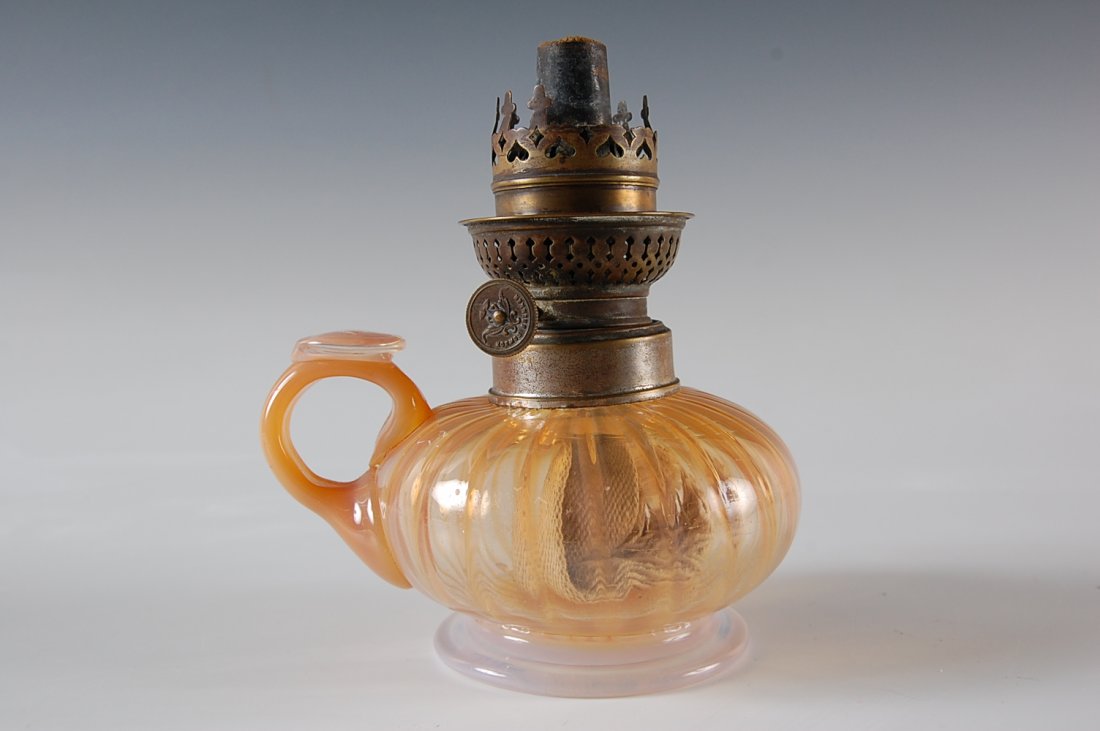 KOSMOS BRENNER FINGER LAMP: Measures 6 x 5 inches.