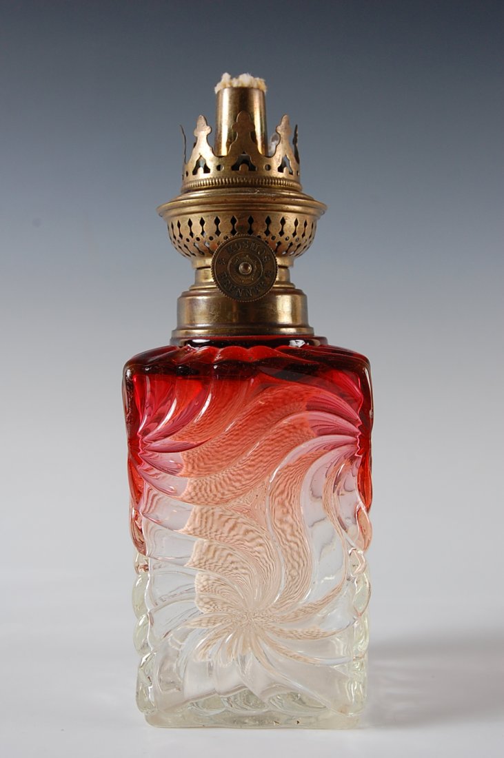 BACCARAT RUBINA SWIRL MINIATURE LAMP: With Kosmos Brenner burner, approximately 8 inches high total