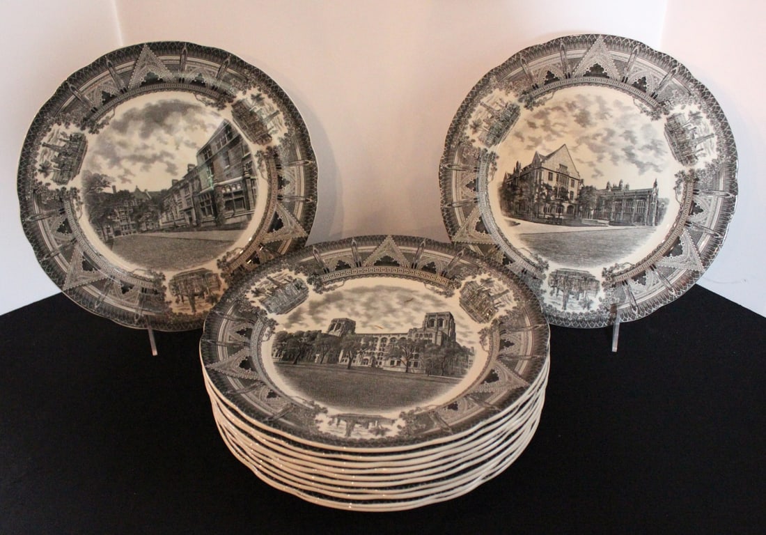 TWELVE SPODE PLATES PICTURING UNIVERSITY OF CHICAGO: Each of the twelve plates pictures a different Gothic building on the University of Chicago's campus, pictured in soft grey transferware, circa 1931. Measures 10.5 inches. Without proof of exemption,