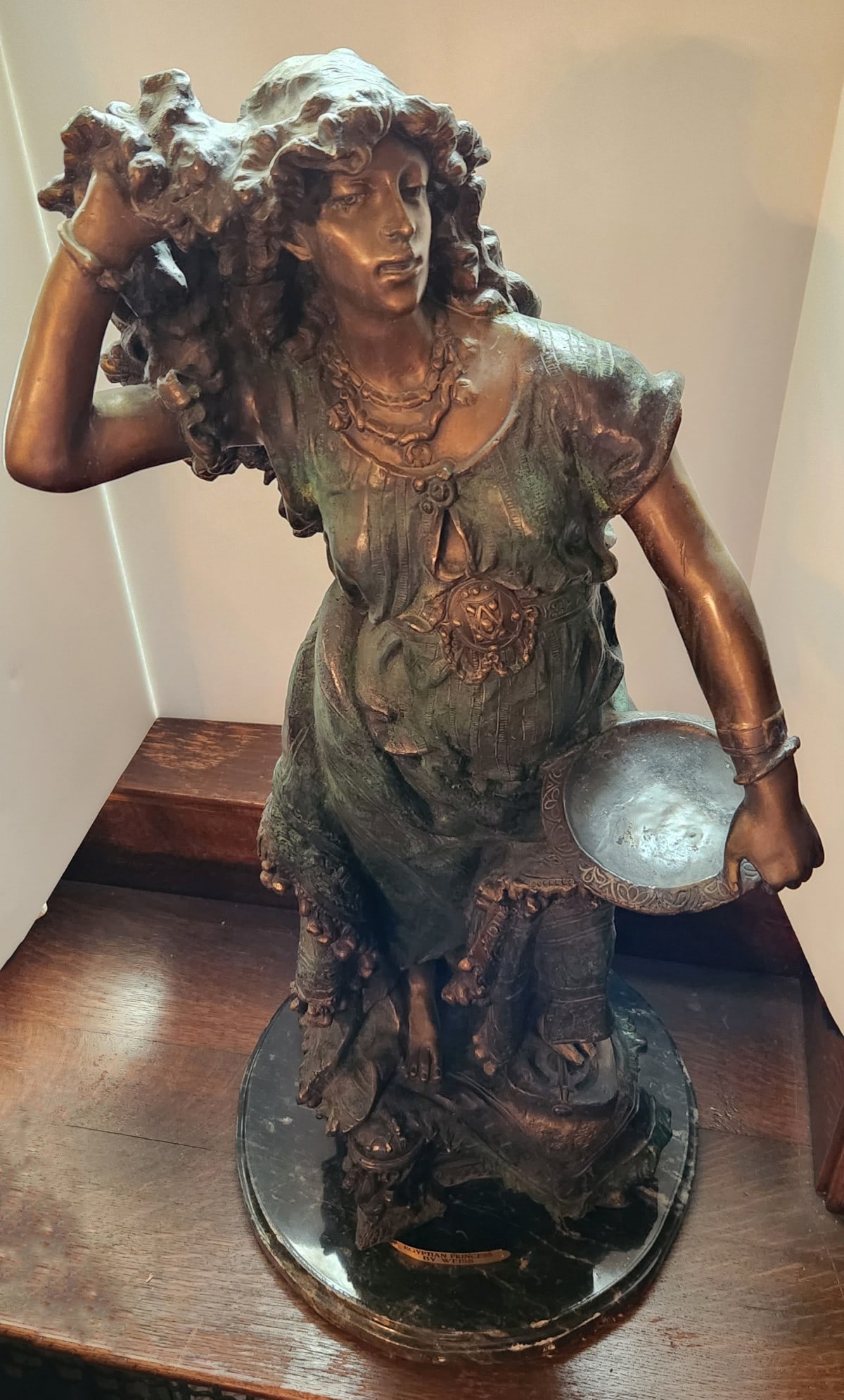 A 20TH CENTURY REPRODUCTION BRONZE SCULPTURE ON MARBLE: The patinated bronze figure is AFTER the work titled Egyptian Princess by Henry Weisse. Measures 32 x 13.5 x 13.5 inches. Without proof of exemption, be aware that internet sales tax applies to all In