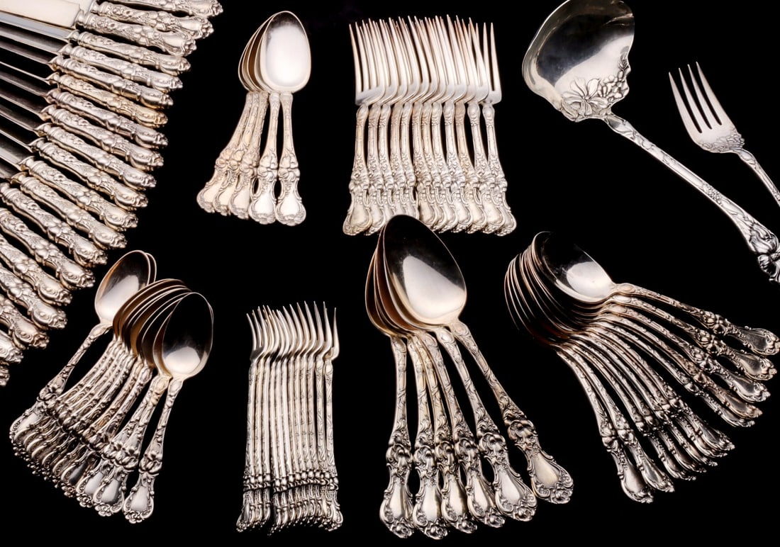 WALLACE 'FLORAL' PATTERN TRIPLE PLATE FLATWARE SERVICE: This assembled set comprises the rare and desirable R. Wallace Floral pattern and similar flatware designs circa 1902. The assemblage is comprised of Twelve 7.5-inch dinner forks; Twelve 5.875-inch co