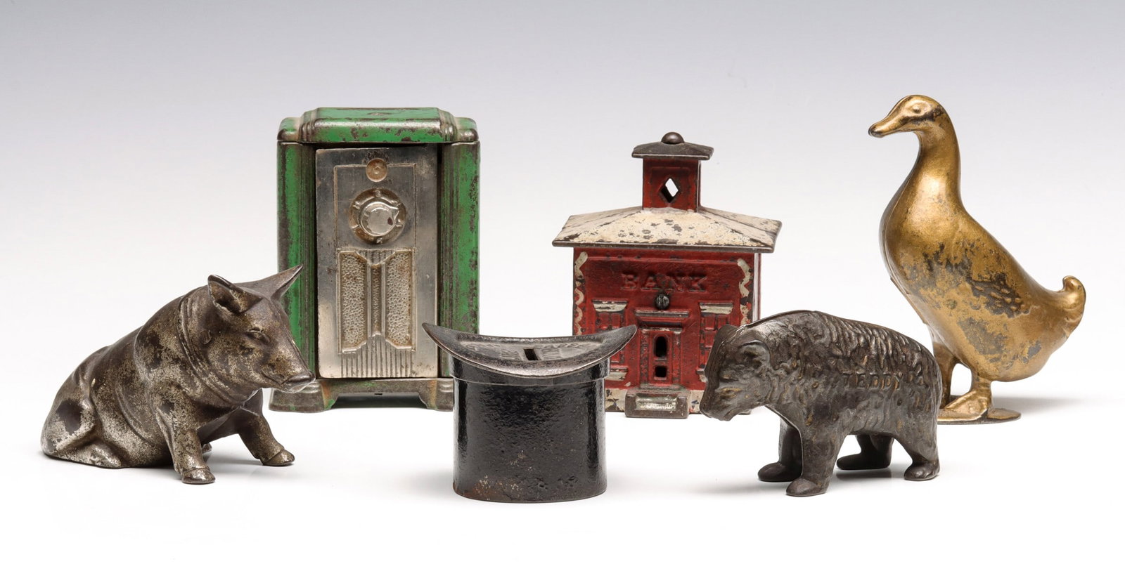 SIX ANTIQUE CAST IRON BANKS INCLUDING TEDDY BEAR (1 of 14)