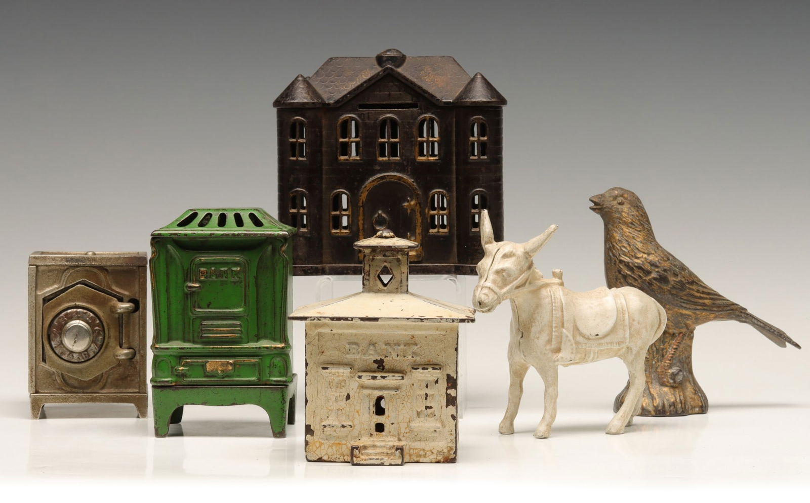 SIX ANTIQUE CAST IRON STILL BANKS (1 of 13)