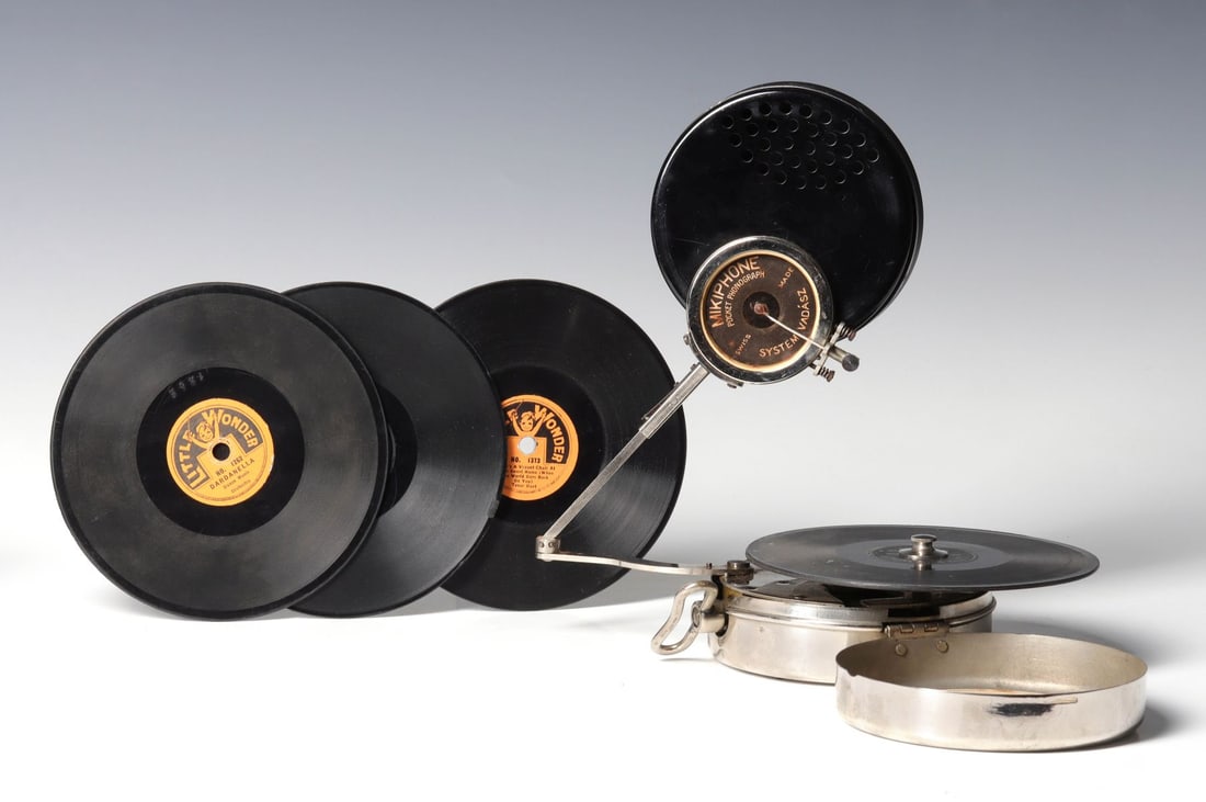 A MIKIPHONE POCKET PHONOGRAPH WITH RECORDS (1 of 17)