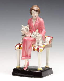 JOSEF LORENZL (1892-1950) FOR GOLDSCHEIDER: The circa 1930 Austrian grouping, a woman with terriers, is signed underside the base. Measures 11.5 x 5.5 x 5.75 inches. Without proof of exemption, be aware that internet sales tax applies to all In