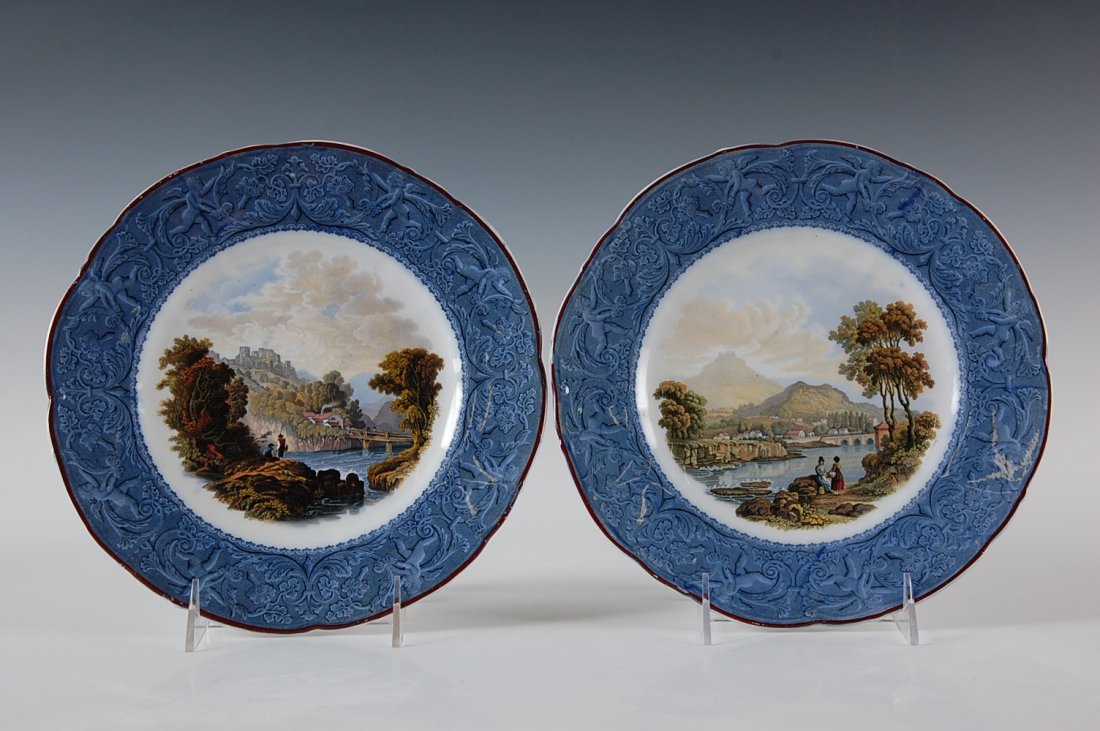 TWO PRATT WARE IRONSTONE PLATES: Measure 9.5 inches in diameter each.