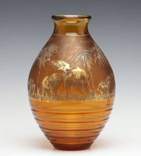 RUDOLF WELS FOR MOSER KARLSBAD ACID-ETCHED ANIMOR VASE: Rudolph Wels For Moser Karlsbad The amber glass Art Deco influence 'Animor' vase with an acid etched frieze of elephants amid palm trees in cameo relief above concentric rings is etched Made in