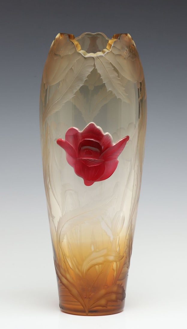 A MOSER INTAGLIO CARVED TOPAZ CRYSTAL VASE WITH CAMEO: The very fine, subtly shaded, topaz-colored crystal vase is deeply carved with serrated leaves rising to poppy flower heads that make up the outline of the cut and polished rim. The body front is cent