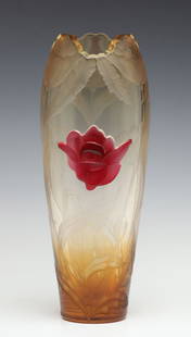 A MOSER INTAGLIO CARVED TOPAZ CRYSTAL VASE WITH CAMEO: The very fine, subtly shaded, topaz-colored crystal vase is deeply carved with serrated leaves rising to poppy flower heads that make up the outline of the cut and polished rim. The body front is
