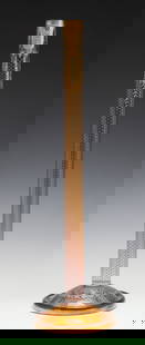 A MOSER BOHEMIAN 24-INCH ROSE SHADED AMBER STICK VASE: The very tall cylindrical vase stands on a domed circular base with thick rolled rim, the whole embellished in gold encrustations over subtly shaded crystal. Measures 24 x 7 inches. Without proof