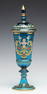 A MOSER BLUE ART GLASS DECORATED POKAL WITH COVER